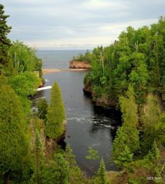 
                    
                        Baptism River into Lake Superior, Tettegouche State Park, Minnesota, USA.
                    
                