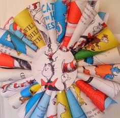 
                    
                        Dr. Suess wreath made from pages of books- TheStyleSisters.b...
                    
                