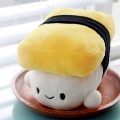 
                    
                        cuddly tamago nigiri (Japanese omelette sushi) plush.
                    
                