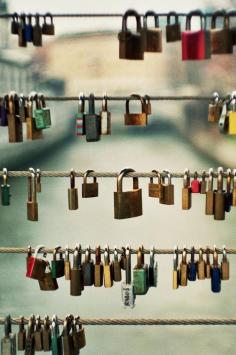 
                    
                        Lovers Bridge, Paris - After locking the love padlock onto the fence, the lovers tossed the keys into the river, a sign of their eternal love.
                    
                