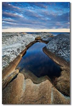 
                    
                        flic.kr/p/9C5zZ9 | miniature lake | <u>Settings</u> ------------------------------------------------- <i>Canon 5d Mark II Canon 17-40mm  Lee soft gnd 0.9  ISO 50, 21mm, f/16, 1' Manuel focus using Live view where I zoom in 100% One RAW file processed in Photoshop CS5</i> ------------------------------------------------- Join me on <a href="http://www.facebook.com/pages/Dan-Andr%c3%a9-Photography/134138389995308/" rel="nofollow">Facebook</a>  <u>Photographers view</u>   Things are happening in Dan’s photo-life these days. A lot actually! As mentioned, I upgraded to the Canon 5d mark II and the Canon 17-40mm a few days ago And I love my new gear! If you haven’t checked out the new, really great web based <a href="#//landscapephotographymagazine.com//" rel="nofollow"> landscape photography magazine  </a> you really should. Two issues have been launched so far and it seems to be an amazing project fully dedicated to landscape photography. Great reading! The reason why I mention this magazine is that I’ve written an article which will be published in the fifth issue! I’m writing about a location I’ve been shooting before and the article will include these three photos I’ve taken: <a href="#//www.flickr.com/photos/danandrephotography/5084847780/in/set-72157624815334417//" rel="nofollow"> chords from a descending sun </a> <a href="#//www.flickr.com/photos/danandrephotography/5170161805/in/photostream//" rel="nofollow"> traces of fire </a> and <a href="#//www.flickr.com/photos/danandrephotography/5117284989/in/photostream//" rel="nofollow"> three in a row </a>   My last upload will also be on the front cover in the 18’Th issue. That’s pretty cool! Just have to be patient ;)  <u>The photograph</u>  When you come to “Verdens Ende” (world’s end) the first thing that meats you’re eye is a little charming marina. The light lit up three sailboats laying friendly in a row and it shure was a beautiful sight. Which I got a few pictures from by the way ;) When you walk further you get to a bridge that takes you to a tine little island. I got a couple of shots from this bridge as well ;) From there you can climb and jump from isle to isle searching for places to photograph. Some of these small isles are pretty large and can give you a great view. As I was wandering around in this beautiful location I found a spot I instantly fell in love with.  I’m very pleased with how the photo turned out. I called it “miniature lake” as I kind of think it looks just like that – A lake surrounded by mountains, a beach in the foreground and a forest on the right side. It makes me feel pretty big! Hope you guys like it. Every comment and fav means the world to me.  <u>The location</u>  This place is called Verdens ende which means Worlds end. It’s a beautiful place and it really feels like the worlds end. It takes about 40 minutes of driving from my home to get there and I’ve been thinking of shooting on this location for a few months. So it was perfect to go here on my first session with my new gear. There are tons of possibilities here and a lot of fun for a photographer. I will definitely go back one day!
                    
                