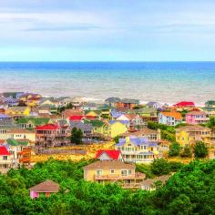 
                    
                        Sequestered in the northern-most reaches of North Carolina's Outer Banks like a prize rose in a garden's private corner, tiny Corolla (population 600) is a resplendent outpost amid white sands and salt water. Coastalliving.com
                    
                