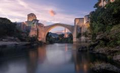 
                    
                        Possibly one of the most picturesque European towns, Mostar in Bosnia. This is a truly iconic bridge, rebuilt using original material after it was destroyed during the war. (From: 12 GORGEOUS Images of the 'Golden Hour' Around the World)
                    
                