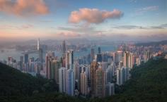 
                    
                        A soft pink sunset over Hong Kong, in stark contrast to the night-time scenes often shot from here at Victoria Peak. (From: 12 GORGEOUS Images of the 'Golden Hour' Around the World)
                    
                