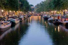 
                    
                        Canals of Amsterdam.  Looks so calm and inviting.
                    
                