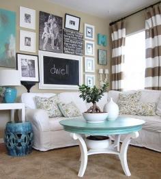 If this was grey instead of brown, I'd love it. Striped curtains, painted coffee table, white couch, framed chalk board.