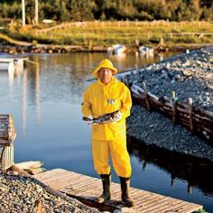 
                    
                        15 reasons to love Newfoundland: Kissing cod and doing shots before heading out to sea. Photo by Michael Hanson. Coastalliving.com
                    
                