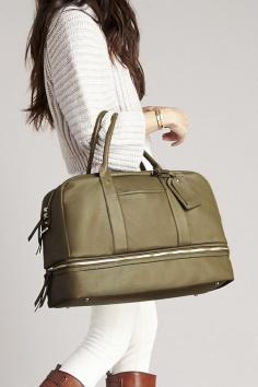 
                    
                        Olive satchel that"s perfect for traveling, the gym, or as a chic diaper bag!
                    
                