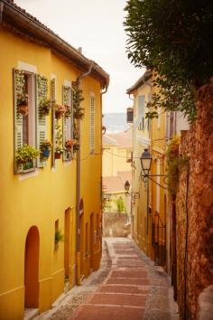 
                    
                        Menton, France - quaint alleys, vibrant art scene and bright facades overlooking sandy shores.
                    
                