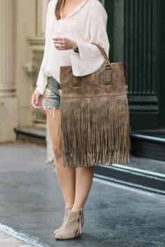 
                    
                        Make a statement this fall with Sole Society's Sonora fringe tote.
                    
                