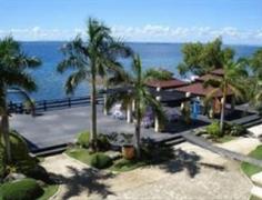 A hotel featuring traditional colonial style architecture set in a lush tropical landscape overlooking the sea and a large, fine white sandy beach on the island of Mactan, off the larger island of Cebu. This is a haven of peace for those seeking the chance to unwind but it is also relatively close to Cebu's business district, accessed by either of the two bridges that link the island, offering business travellers the ideal spot to relax after a busy day. Facilities at this large hotel include meeting spaces, suitable for corporate events and private celebrations, 2 large outdoor swimming pools overlooking the sea, a bar and lounge, restaurant and children's play area. There is also an outdoor dining area and poolside terrace. The reception is open 24 hours a day and the friendly staff are on hand to deal with guests' requests. The comfortable rooms all have a balcony or patio.