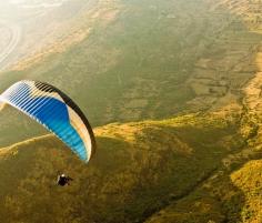 The Mountains slopes in Vagamon in the district of Idukki is the ideal place if you love paragliding and other adventurous activities.Vagamon is fast emerging as the paragliding hotspot. Get the perfect bird's eye view of the god's own country Kerala, at nearly 6,000 ft above sea level. The paragliding season starts from September and offers great flying conditions until January and again, from March to May. Float among the clouds like birds and have an amazing experience.  The paragliding Grand Prix held during September every year brings together paragliders from across the world.The green carpeted hills and the cool breeze makes Vagamon stand out as the best paragliding destination in South India. Add this amazing location on your trip to Kerala if you are an adventurous traveller.