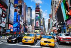 Times Square with traffic in Manhattan, New York City.